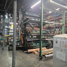 Wolverine, 6-Color Flexo Stack Press, 68" wide, 60" unwind diameter, 25" print cylinders, 50" repeat, 60"