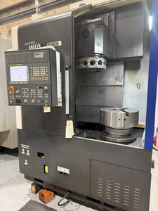 21.7" Hyundai Wia #LV500LM, CNC vertical turret lathe, Fanuc 32i-B, 29.9" swing, 20" table diameter, 20"