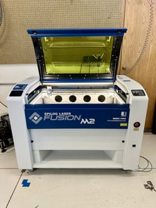 Epilog #Fusion-M2-32 dual source laser, 50 watt Co2 source, 30 watt fiber source, air assist, 2015