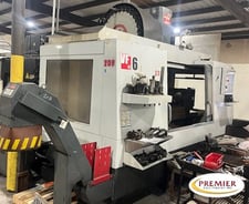 Haas #VF-6/50, CNC vertical machining center, 64" X, 32" Y, 30" Z, 7500 RPM, 30 side mount tool changer, thru