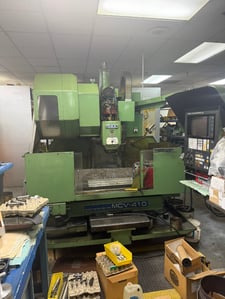 OKK #MCV-410 CNC 4-Axis vertical machining center, MATIC-G Control, 39.3" X, 16.1" Y, 15.7" Z, 1983