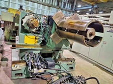 30000 lb. Roelhen, double end uncoiler, 42" mandrel face, 18"-21.5" ID, hydraulic expansion, 9" diameter