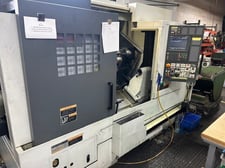Mori Seiki #NL-2500, CNC Lathe w/Bar Feeder, 3-Axis, 36.4" Swing, 27.8" Machining length, 10" Chuck, 2.9"