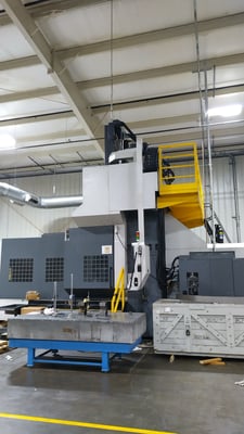 YCM #DCV-4030B-5AX Travel, 5-axis Bridge Mill, 160" x137.8" x40" travel, 122" between housing, 10000 RPM, 60