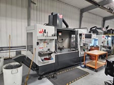 Haas #VF-4, CNC Vertical Machining Center, 50" X, 20" Y, 25" Z, 30 HP, 8100 RPM, 20-pocket automatic tool