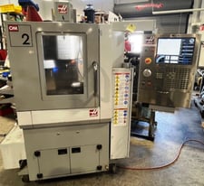 Haas Model OM-2A CNC Office Mill, 4-Axis, 12" X, 10" Y, 12" Z, ISO-20 Tpr, 40000 RPM, 20ATC, New 2008.