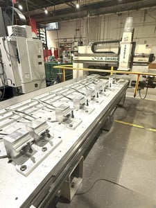 Onsrud #145G12, CNC router, 145" X, 61" Y, 11" Z, 24000 RPM, 12 HP, HSK-63F, 12 tool ATC, Fanuc 0i, 2200