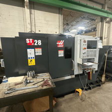 Haas #ST-28, 2-Axis CNC Lathe, 21" swing, 12" chuck, 4" bar, 40 HP, 3200 RPM, Haas CNC control, tailstock