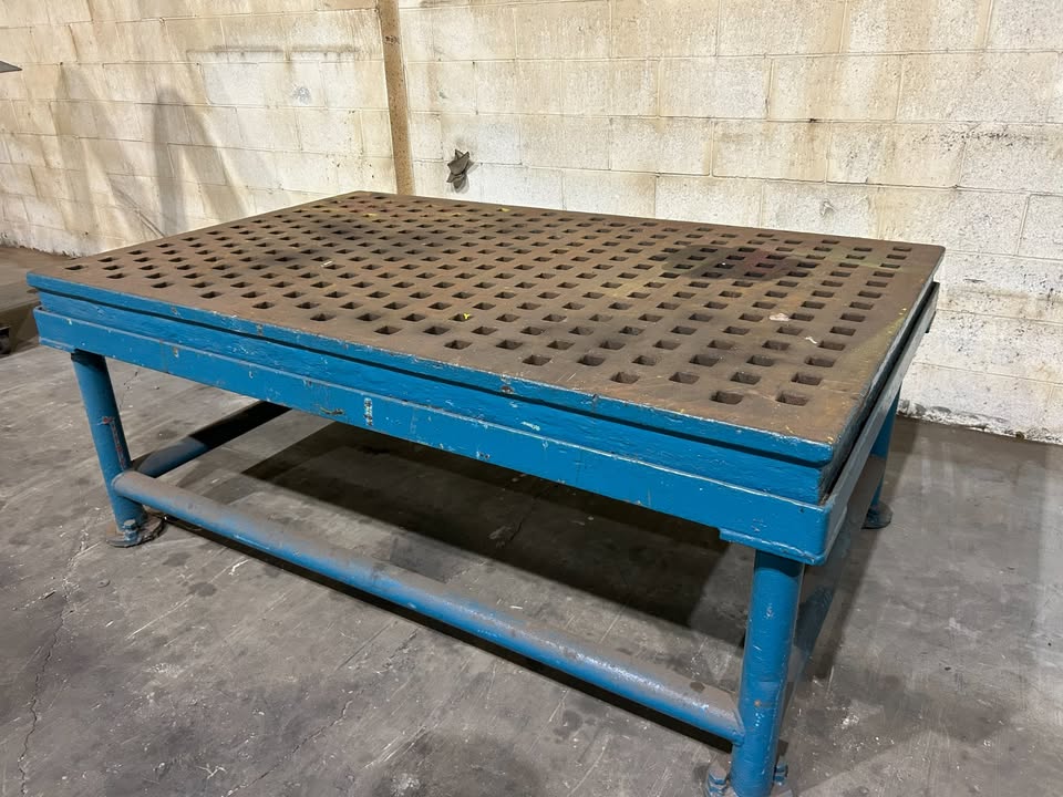 3.11' x 6.3' Acorn welding table, 30" height
