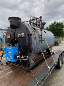 80 HP Williams and Davis 15 psi steam boiler with SS feed water tank and Grundfos pump
