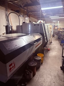 Haas #SL-30, CNC Lathe, 30" swing, 17" cut diameter, 34" turn length, 30 HP, live tooling, bar feeder, 2006