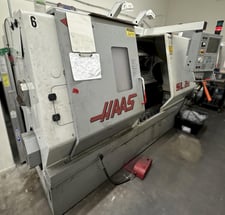 Haas #SL-30, CNC turning center, 30" swing, 10" chuck, 3-jaw, 3" bar, 14.5" dia., 34" lgth, 12 turret, 3400