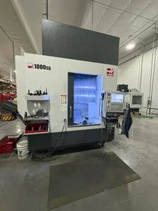 Haas #UMC-1000SS, 5-Axis, CNC vertical machining center, 50+1 side mount tool changer, 40" X, 25" Y, 25" Z