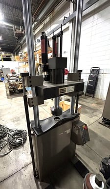22 KIP (100kN), MTS #318.10, top mount actuator, 2 columns, 20.75" btwn columns, 20.75" x 8.25" table