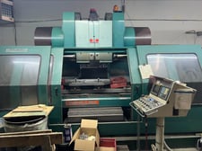 Matsuura Twin Spindle Model MC-1000V vertical machining center, Fanuc 15M, Chip Conveyor, 40" X 20" X 20", 32