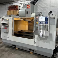 Haas #VF-3B, CNC vertical machining center, 24 automatic tool changer, Renishaw touch probe, auger chip