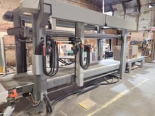 Comil #TP-1000, case clamp, automatic feed thru, 12"-49" working height, 9.8"-116" working length, 2008