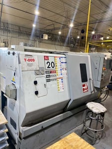 Haas #SL-20T, CNC Turning Center, 23" swing, 24" machining length, 10.3" turning diameter, 2" bar, 8" chuck