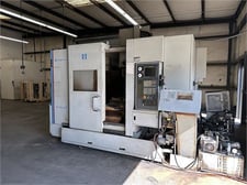 Bridgeport #XR-700, CNC vertical machining center, 36 automatic tool changer, 27.6" X, 23.6" Y, 21.7" Z
