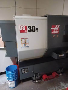 Haas #DS-30Y, CNC lathe, 31.8" swing, 10" chuck, 3" bar, 23" centers, 4500 RPM, 12 turret, automatic tool