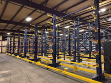 Double sided cantilever racking, 16' H x 12' W, 24" arms length, 11000 lb. capacity per section, 12 sections