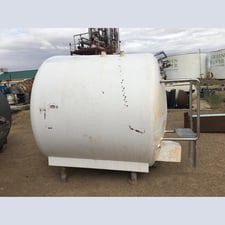 1,500 gallon Cherry Burrell, Stainless Steel horizontal storage tank, with manhole, steel legs (3 available)