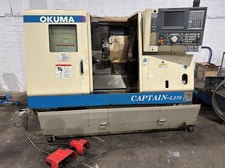Okuma #Captain-L370 Big Bore, CNC turning center, OSP-E100L Control, 10" chuck, tailstock, 2001