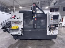Haas #VF-4, CNC vertical machining center, 20 automatic tool changer, 50" X, 20" Y, 25" Z, 8100 RPM, 8100