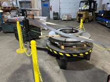 7500" lb. Norwalk #CR7552, pallet decoiler, 52" diameter table, loop control arm, 220 V.