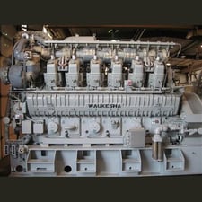 2100 KW Waukesha #12V-AT27GL, natural gas generator set, continuous duty, open skid, 2955 HP, unused surplus