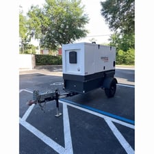23 KW Generac Magnum #MMG25IF4, portable diesel generator, prime, trailer mtd, Isuzu 36 HP engine, 13,230