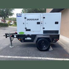38 KW Daewoo Doosan #G50WDO-3A-T4F, portable rental diesel generator, prime, trailer mtd, no DEF, 3,273.7