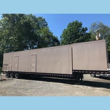 2000 KW MTU, portable diesel generator, 4160 Volts, 16-cyl Rolls-Royce engine, containerized, trailer mtd