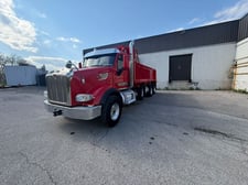 Peterbilt #567, tri axle dump truck, diesel, 18 speed, automaticf transmmission, air ride, storage box, tarp