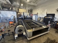 CNC Fiber Laser Cutting System, 6000 watt, 5' x 10' table, rotary chuck/tube positioner, cooling unit, PC