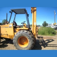 5,000 lb. Case #585E, rough terrain forklift, 14 ft. lift, Cummins 3.9L diesel, 2-stage mast, 1999