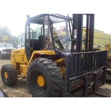 6,000 lb. JCB #930, forklift, 4WD, Perkins 4-cyl engine, 4-speed trans, 14 ft. forks, 10,338 hours, 1997