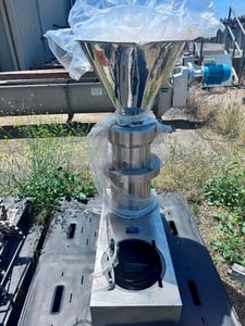 Monaz, Vertical Stone Mill, 8" grinding chamber diameter, 4-1/2" discharge chute width, stainless steel feed