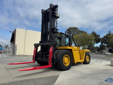 80000 lb. Caterpillar #V800, 240" lift height, 8' forks, container attachment