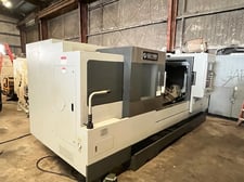 Ganesh #ASL-15LX, CNC lathe, long bed, Fanuc 0iTD, 4.1" bar, 3-jaw 15" powered chuck, chip conveyor, 2020