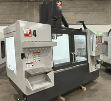 Haas #VF-4, vertical machining center, 50" X, 20" Y, 25" Z, 30 HP, 8100 RPM, 52" x 18" table, 20 automatic