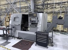 Leadwell #T-8, CNC lathe, 26.3" swing, 10" chuck, 3" bar, 35-3500 RPM, 25 HP, Fanuc 0i-TC, tailstock, chip