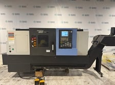 Daewoo Doosan #Puma-GT2600, CNC Lathe, 24.8" swing, 3.2" bar, 12 position turret, 30 HP, Fanuc OI-TF, Chip