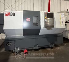 Haas #ST-30, CNC lathe, 21" swing, 12" chuck, 3-jaw, 3" bar, 15" dia., 32.5" lgth, 12 turret, rigid tap, 2010