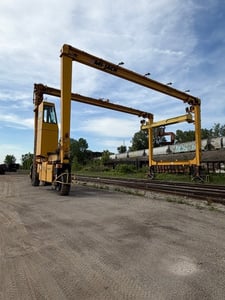 100000 lb. Mi-Jack Travelift #750D, 49' 5" inside clear width, 28'10" hook height, 24' wheel base