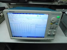Tektronix #TLA6402, Logic Analyzer, 68 channels, 500 ps timing resolution, 235 MHz state, 128 MB memory