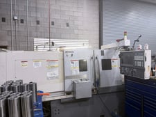 Okuma Genos #L300E-M, CNC lathe, 24.7" swing, 41" machining length, 10" chuck, 2.8" bar, 3000 RPM, 20 HP