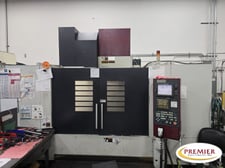 OKK #VM-7III, CNC vertical machining center with rotary table, Fanuc 180isMB, 60.2" X, 29.1" Y, 25.9" Z, 8000