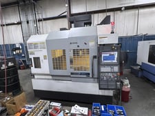 Okuma #Genos-M560V, CNC vertical machining center, 32 automatic tool changer, 41.3" X, 22" Y, 18.1" Z, 15000