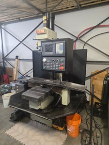 Topwell, CNC vertical machining center, 30.9" X, 19.7" Y, 20.9" Z, #40, 7.5 HP, 4-Axis Control & servos, 1998